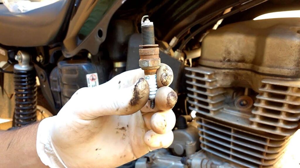 quando trocar a vela da moto